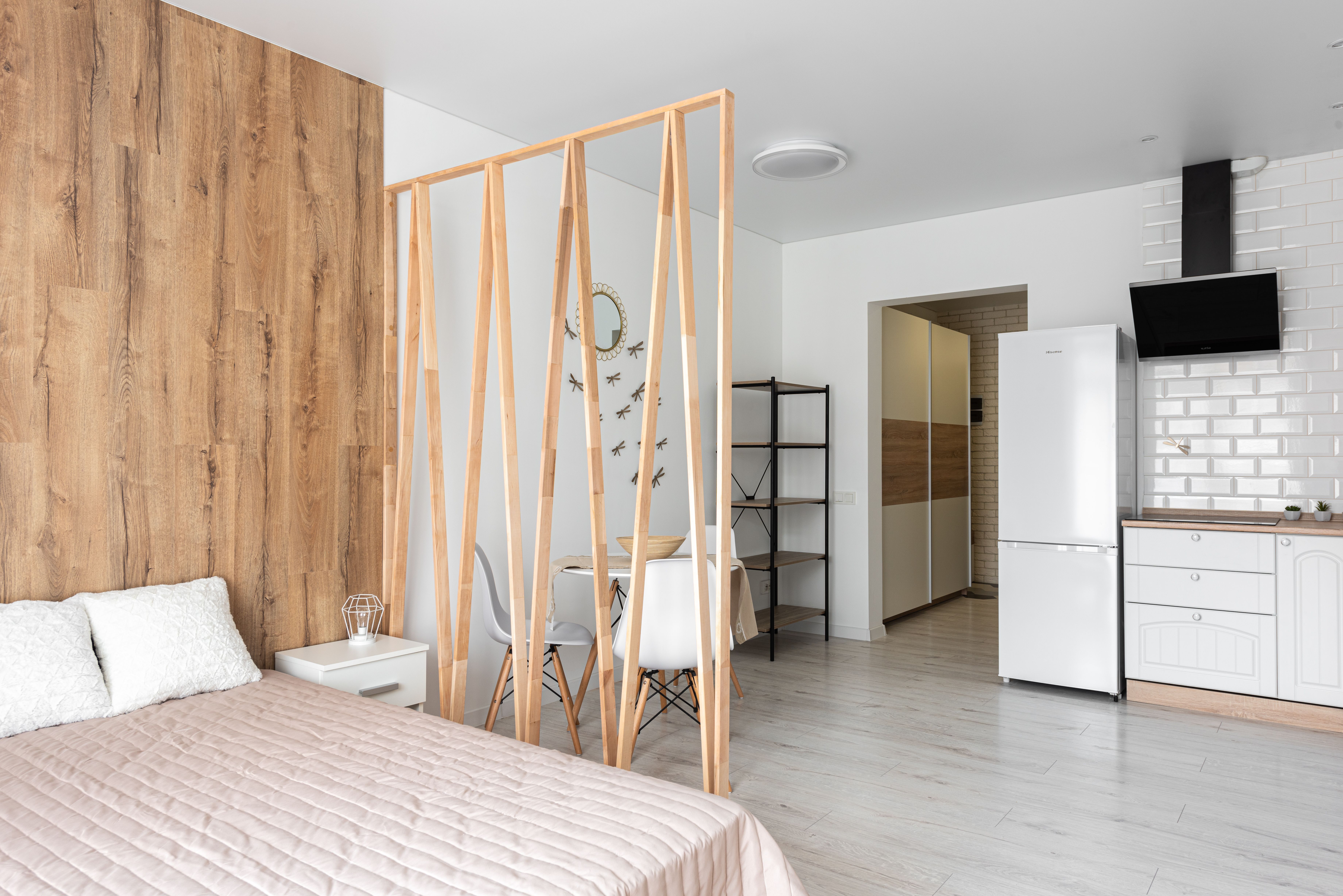 Illustrative stock photograph of a compact apartment with a sleeping area